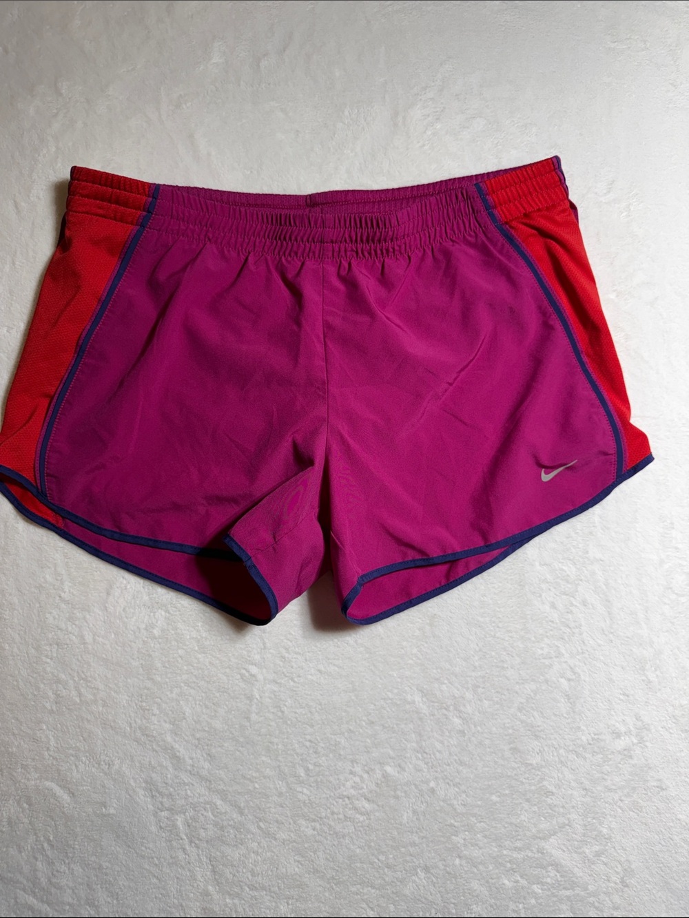 Nike Women’s Magenta Athletic Shorts with Orange Side Panels